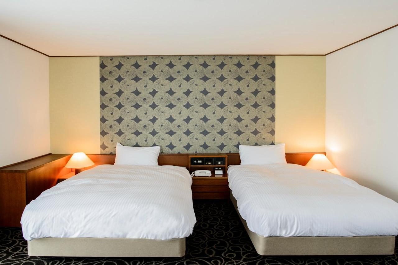 Suikouen Hotel Куруме Экстерьер фото