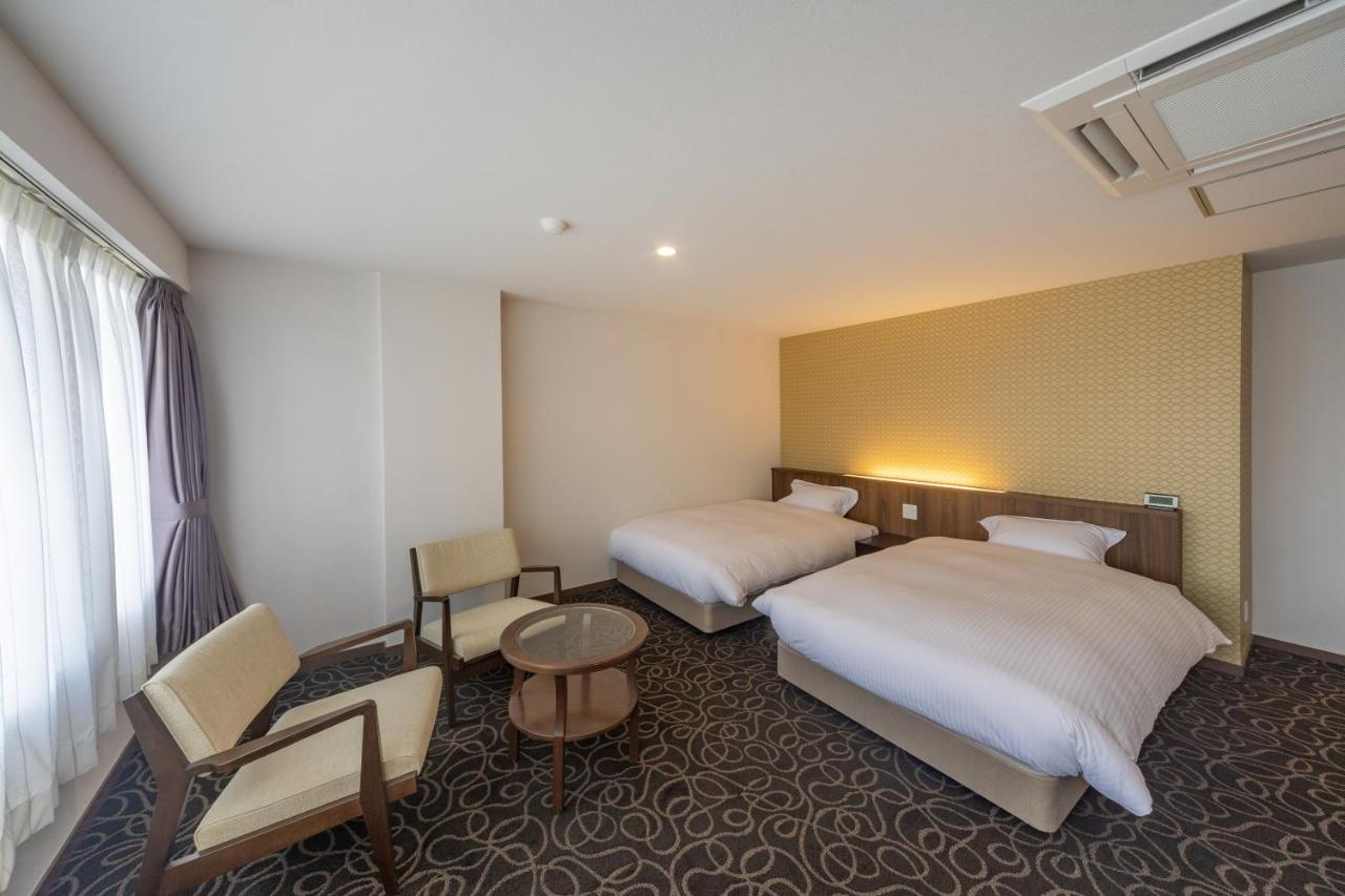 Suikouen Hotel Куруме Экстерьер фото