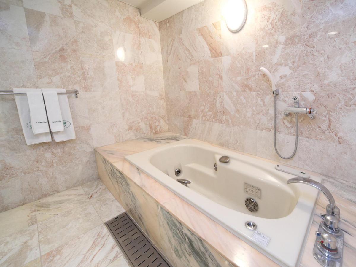 Suikouen Hotel Куруме Экстерьер фото